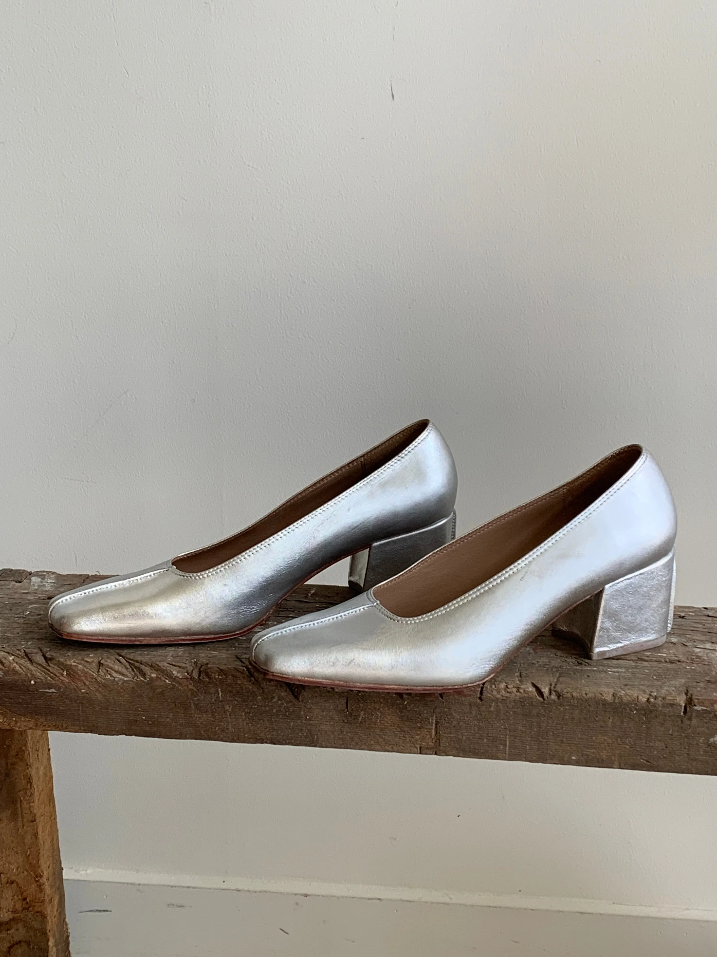 No. 6 silver pumps
